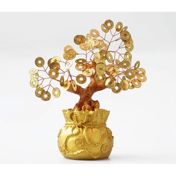 Tree with golden coins in a bag